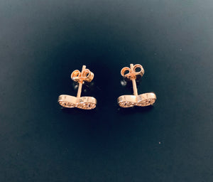 Women’s rose gold infinity diamond stud earrings