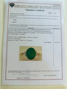 Natural Oval Emerald with diamonds yellow gold ring