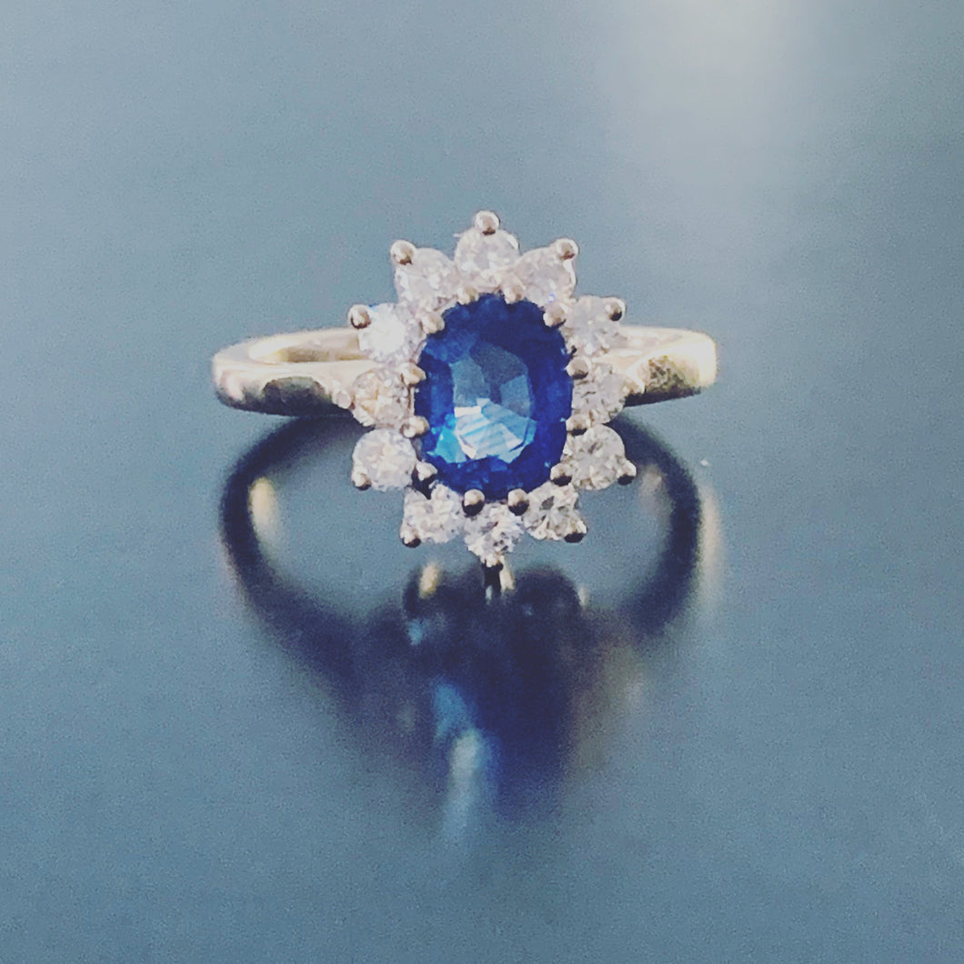 Women’s sapphire and diamond flower gold ring