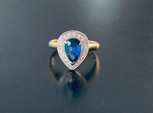 Women’s pear cut sapphire & diamond ring