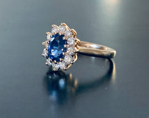 Women’s sapphire and diamond flower gold ring