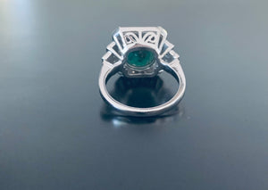 Women’s natural emerald and diamond shield ring