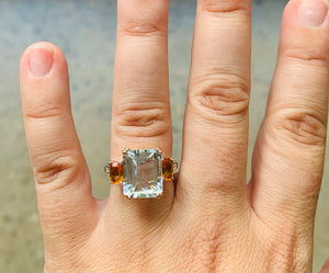 Women’s Aquamarine, orange sapphire and diamond ring