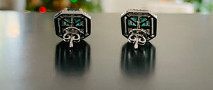 Stunning women’s emerald and diamond earrings