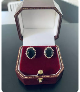 Women’s dark blue sapphire and diamond stud earrings