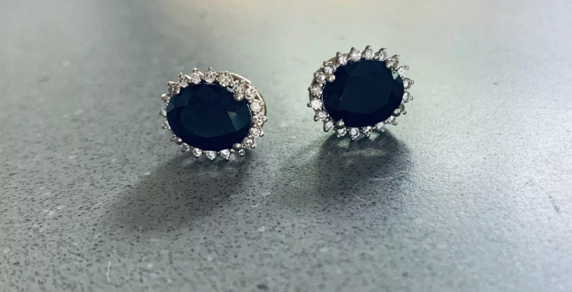 Women’s dark blue sapphire and diamond stud earrings